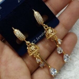 Earrings by  Buddy Overseas 