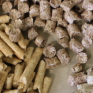 Yellow and cappucino colour wood pellets. Premium and industrial classes.