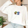 EMBROIDERED SHIRT, MOVIE EMBROIDERED Crewneck Sweatshirt