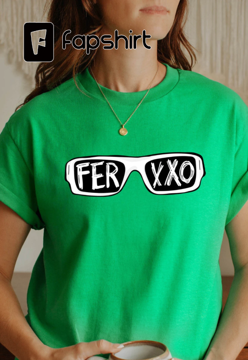 Fexxo’s Iconic White Sunglasses (Grafitas) on Green T-Shirt – The Ultimate Fan Gear for Nitro Jam Underground Tour