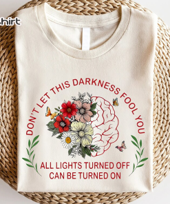 Don’t Let this Darkness Fool You T-Shirt…