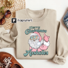 Santa’s Favorite Swiftie Shirt, Taylor Swift Christmas Shirt, Christmas Gift for Swifties, The Eras Tour Christmas Shirt