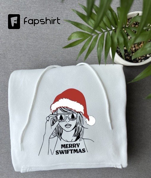 Festive Merry Swiftmas Sweatshirt – Unique Swiftie Merch – Cozy Fan Apparel – Xmas Hat Theme Design – Winter Fashion Statement