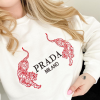 Sleeping Beauty Princess Auroa and Prince Phillip embroidered crewnecks.