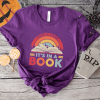 Take a Look it’s in a Book Rainbow Librarian and Reading Tshirt | 3/4 Sleeve Raglan | Gift for Librarian or Bookish Reader