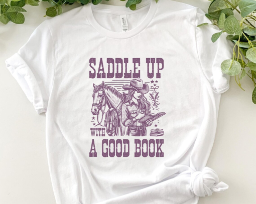 Saddle Up With A Good Book Cowgirl Shirt, Retro Western Book Lover Shirt , Vintage Style Graphic Shirt, Cowboy Romance Shirt Howdy Shirt