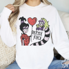 Never Trust The Living Sweater And Tee, Beetlejuice Tee Shirt, Horror Halloween films, Humorous Halloween Gifts Hoodie