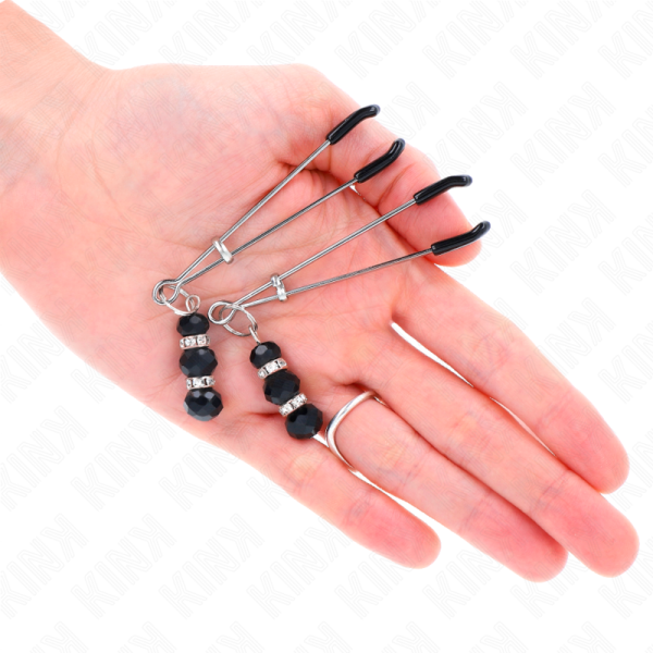 KINK - PINÃAS FINAS DOURADAS COM 3 CONTAS DE VIDRO PRETAS 7 CM - Imagen 3